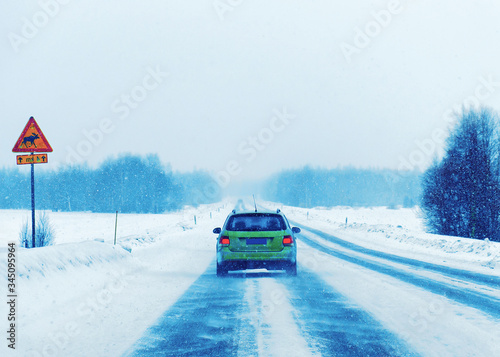 Cars in road in winter Rovaniemi of Finland reflex