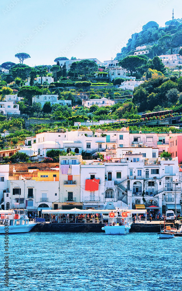 Harbor of Capri Island and boats reflex