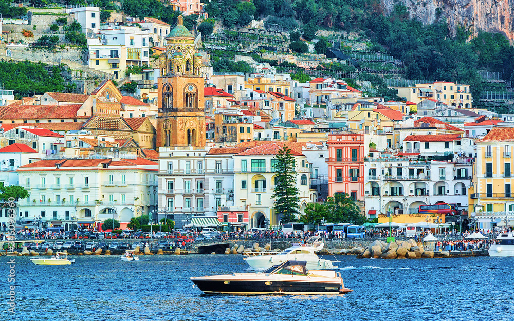 Yacht at Amalfi town in Tyrrhenian sea in autumn reflex