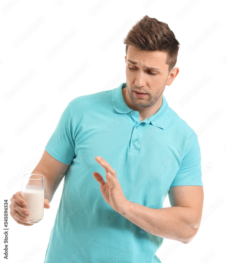 Young man with milk allergy on white background Young man with milk allergy on white background
