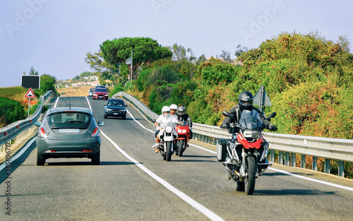 Motorcycles and cars in road in Costa Smeralda reflex © Roman Babakin