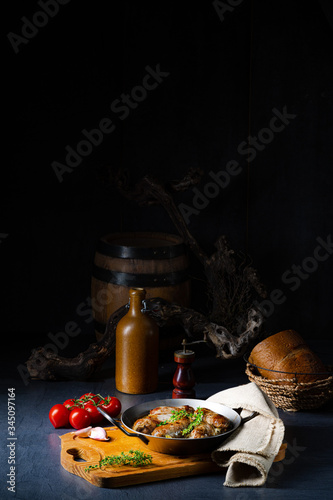 Homemade white sausage fried with onion and herbs