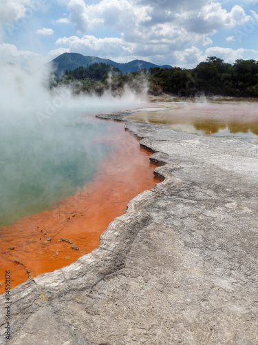 An orange blue volcanic hot spot in Rotorua, New Zealand