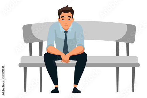 Vector character illustration sad man sits at sofa alone