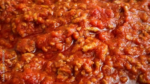 Close up of tasty bolognese sauce (ragù alla Bolognese). Typical sauce for Italian pasta