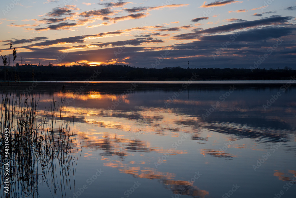 morning lake with sunrise and cloud reflection, czech karvina