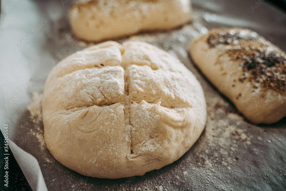 Uncooked bread before being baked Uncooked bread before being baked