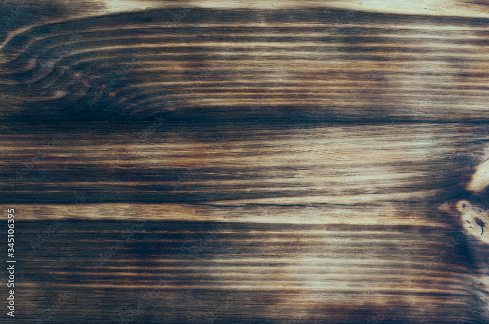 Fototapeta premium Wood background. Wood texture. Charred board