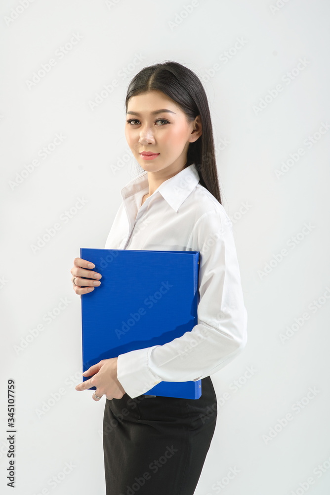 Office girl, company staff holding files and checking work from files on white background. Business, online trading, presenter concept. Office girl, company staff holding files and checking work from files on white background. Business, online trading, presenter concept.