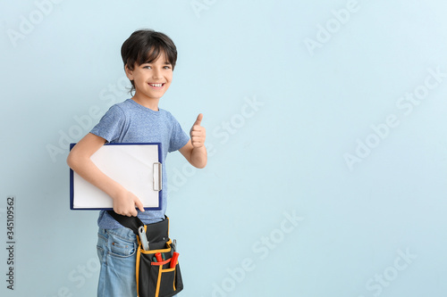 Portrait of little plumber ...