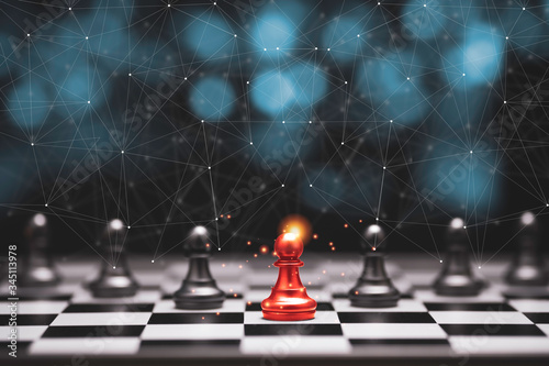 Quadro em tela Red pawn chess stepped out of line to leading black chess and show different thinking ideas
