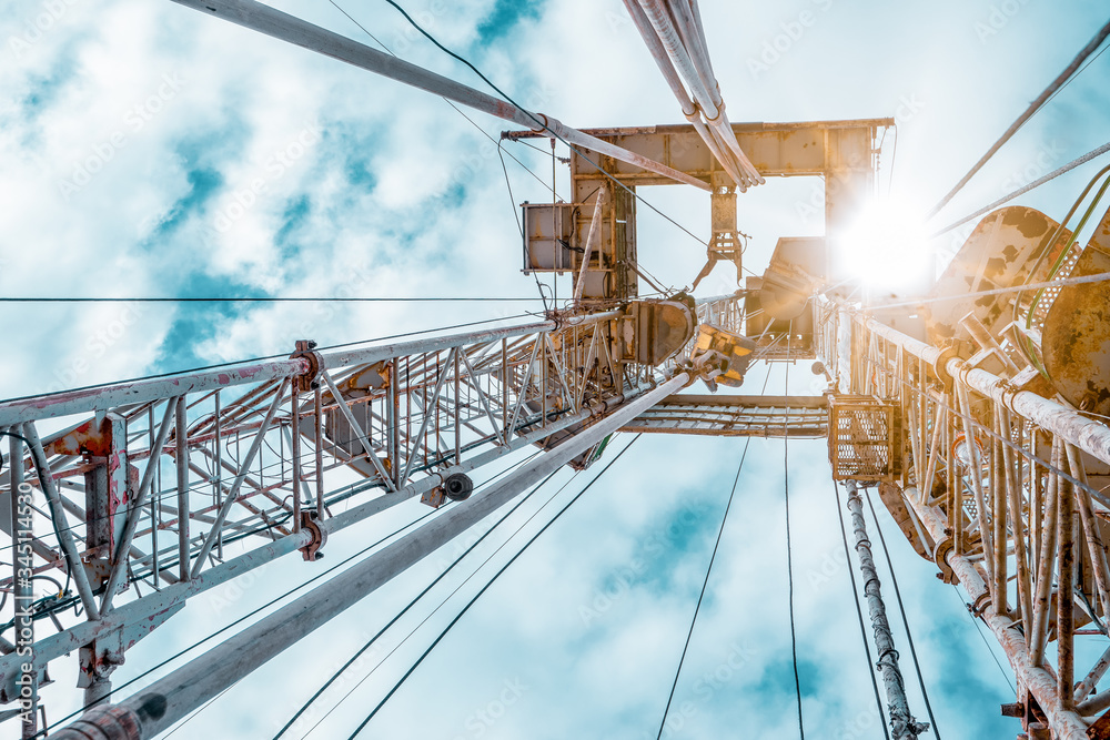 Drilling rig in oil field for drilled into subsurface in order to produced crude, inside view. Petroleum Industry. Onshore drilling rig. Drilling rig in oil field for drilled into subsurface in order to produced crude, inside view. Petroleum Industry. Onshore drilling rig.