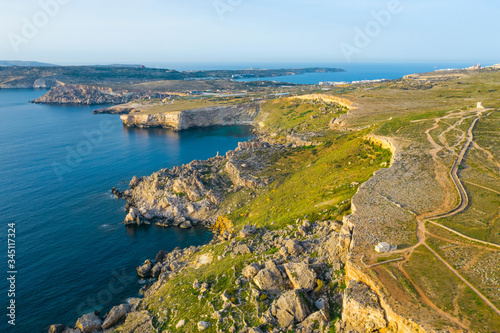 Aerial view of nature cliffs. Mediterranean sea, evening, sunset. Winter. Malta island