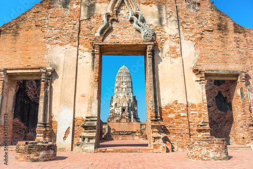 Brick wall and remains of Wat Mahathat temple. Historical and religious architecture of Thailand - ruins of old Siam capital Ayutthaya