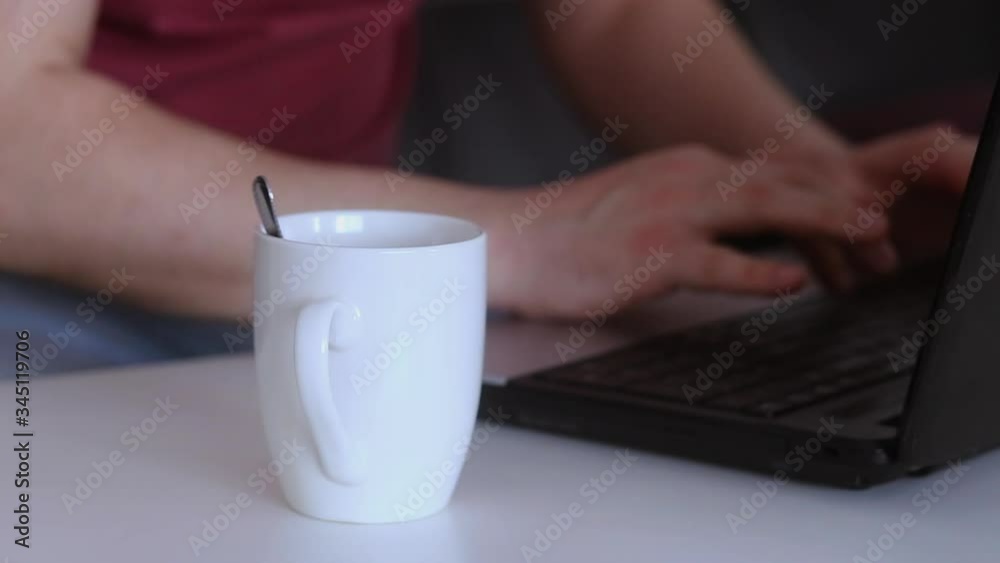 Adult working from home. Person typing on laptop keyboard. Adult working from home. Person typing on laptop keyboard.