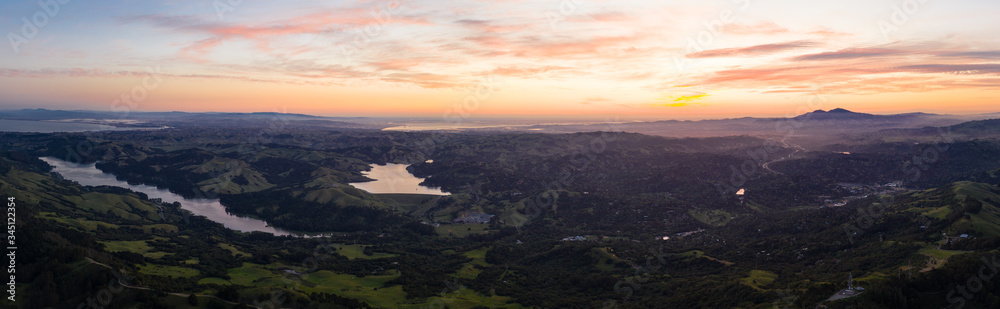 Sunrise greets the tranquil, green hills of the east bay region of Northern California, just east of San Francisco Bay. This beautiful area is green in the winter and spring and golden in the summer.