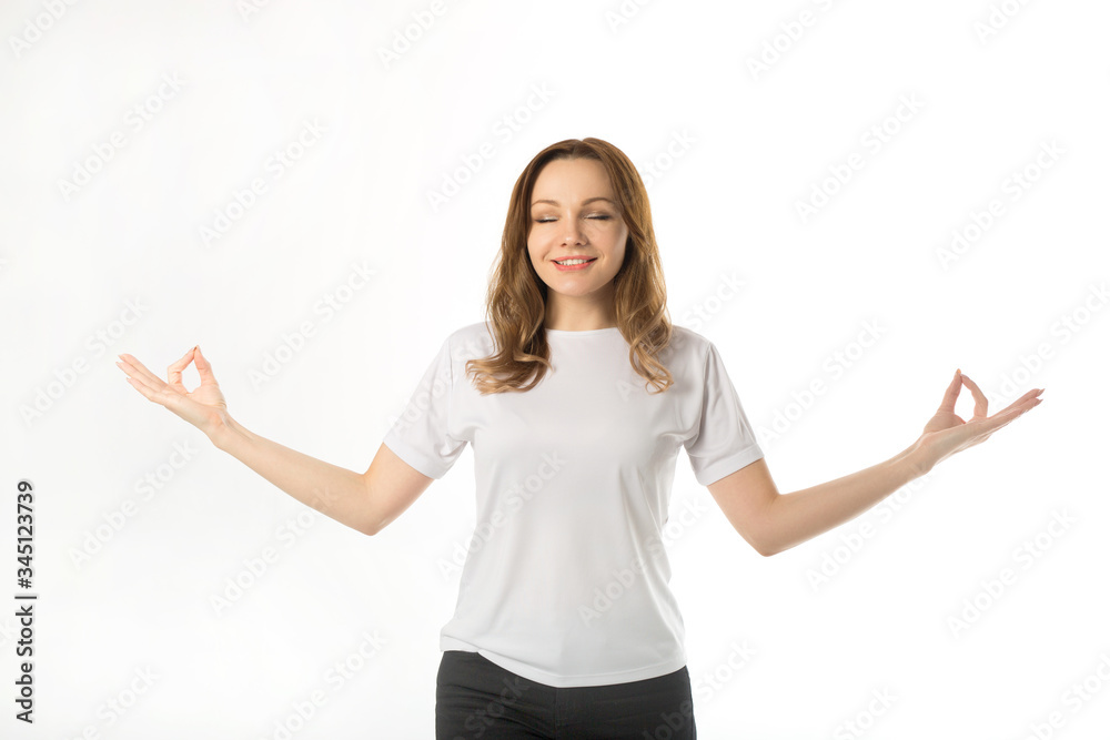 beautiful young woman in white t-shirt on a white background with hands up beautiful young woman in white t-shirt on a white background with hands up