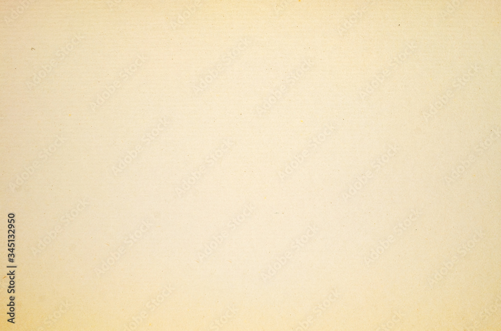 A dense industrial sheet of grey paper with a textured surface A dense industrial sheet of grey paper with a textured surface