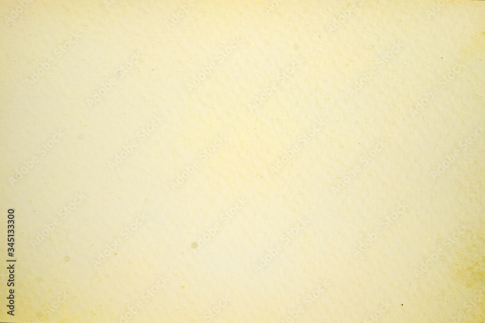 A dense industrial sheet of grey paper with a textured surface A dense industrial sheet of grey paper with a textured surface