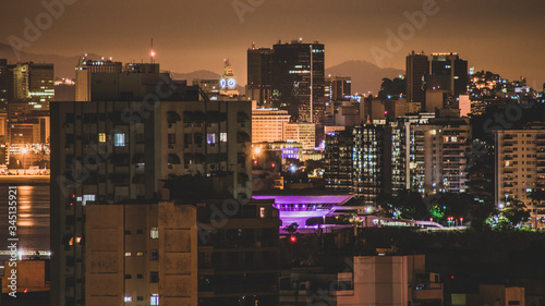 Imagem do Museu de Arte Contemporânea durante a noite em Niterói, Rio de Janeiro, Brasil. Um projeto do renomado arquiteto brasileiro Oscar Niemeyer, que tem diversas obras no litoral dessa cidade photo