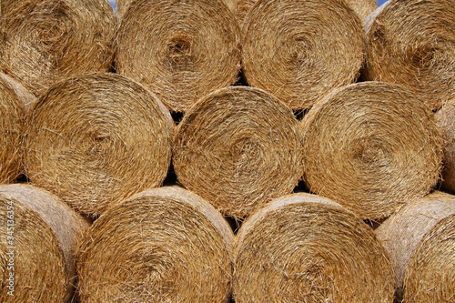 Stack of hay bales in country farm