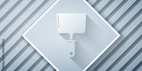 Paper cut Putty knife icon isolated on grey background. Spatula repair tool. Spackling or paint instruments. Paper art style. Vector Illustration