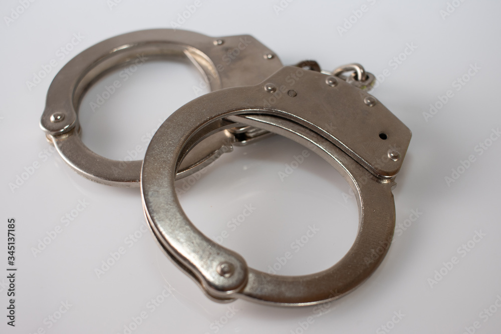 steel metal Handcuffs on  white background isolate