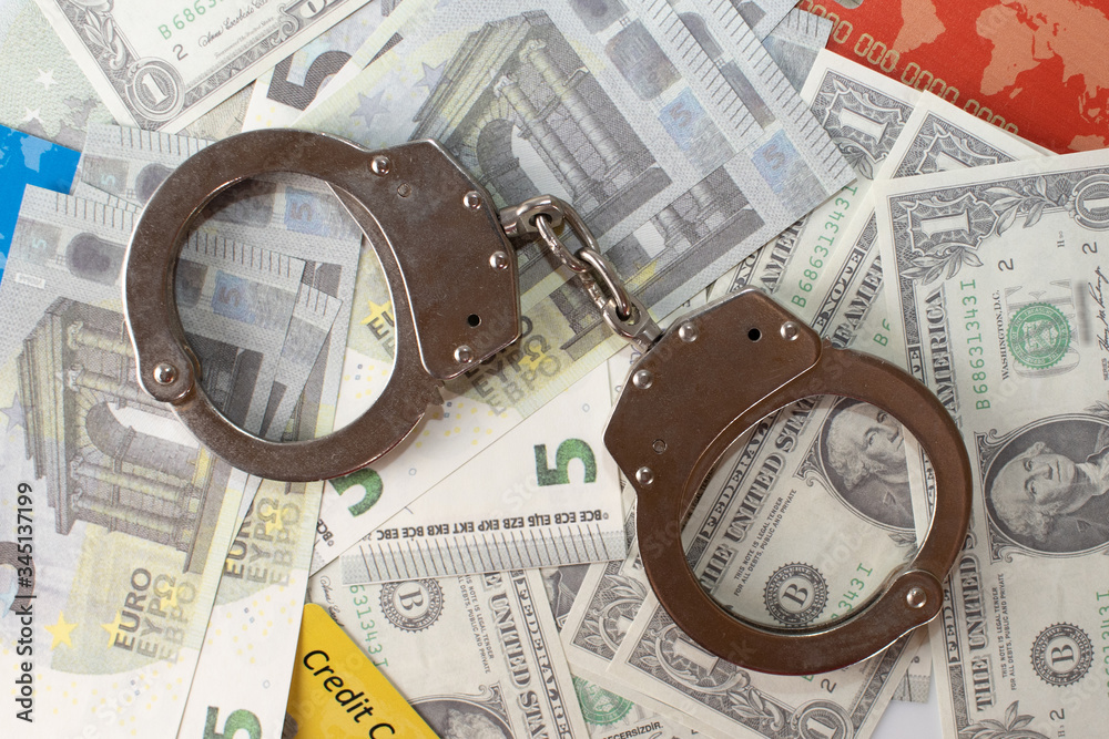 Dollar euro and credit cards With Handcuffs. Dollar euro and credit cards With Handcuffs.