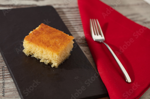 revane, revani, traditional ethnic dessert sponge cake with syrup, photo