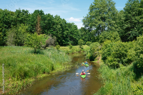 Kayaking on the Narewka River in the Bialowieza National Park.