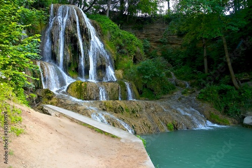 Fototapeta Naklejka Na Ścianę i Meble -  Lucansky waterfall - located in the middle of the village Lucky in Liptov.