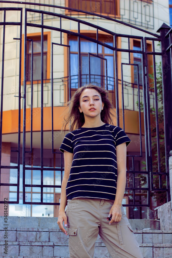 Cool girl walking on the streets of city Cool girl walking on the streets of city