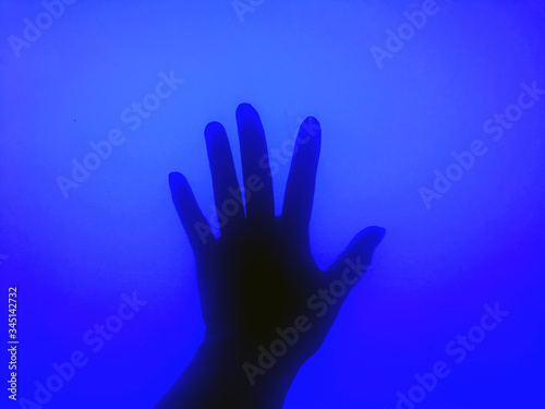 hand in blue