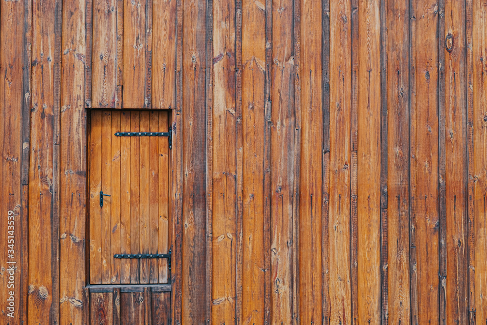 Wooden wall from planks with a door on the left side, Wooden wall from planks with a door on the left side,