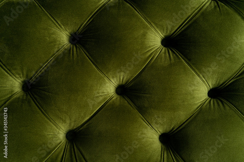 Part of green velvet sofa top view photo
