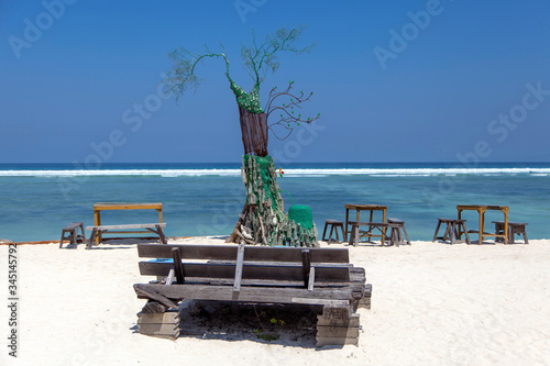 beach exotic chairs on a tropical beach, gili trawangan island, Bali, Indonesia. photo