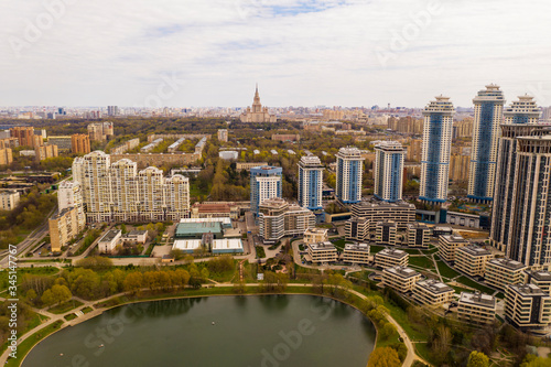 residential buildings around the city lake removed from the drone