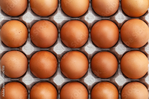 Background brown of chicken eggs in egg carton