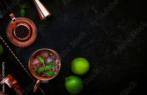 Photography Preparation Moscow Mule cocktail with ginger beer, vodka, lime and ice