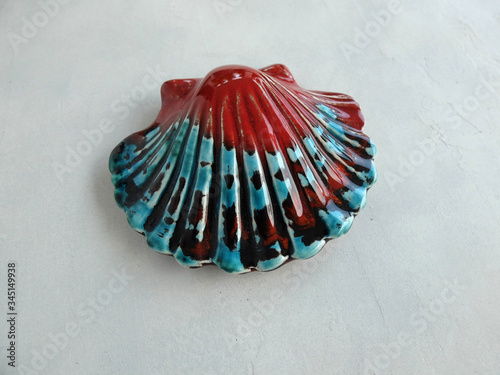 Ceramic colorful handmade sea shell on clean background