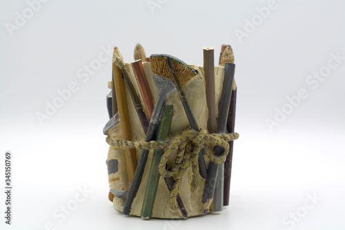 Empthy artistic pencil holder on clean background