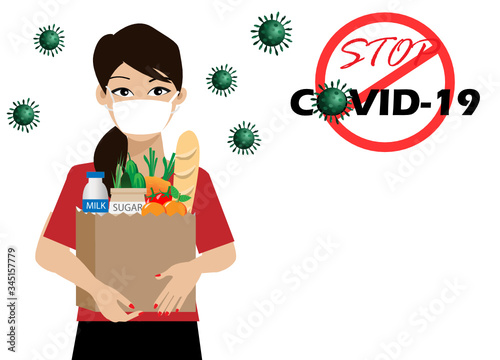 Young beautiful woman wearing surgical mask holding grocery bag full of food products, corona virus diseases  (COVID-19) background.  Idea for COVID-19 outbreak, prevention and awareness.
