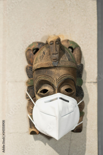 mask hanging on wall with mask