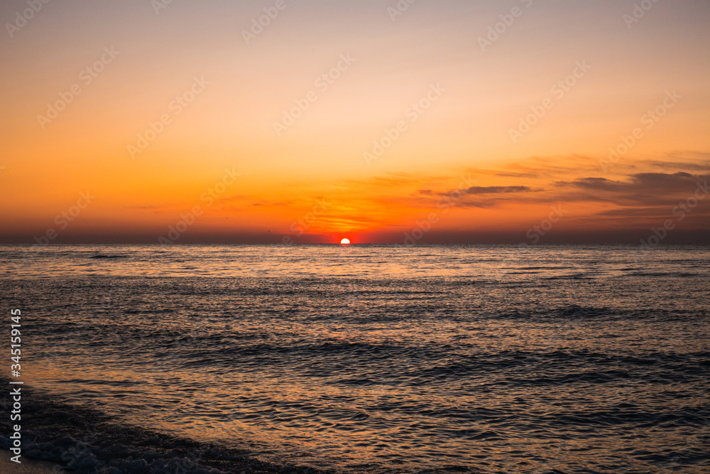 amazing sunrise sea in the summer or early autumn