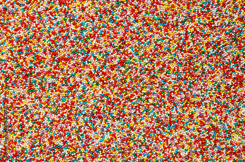 Colorful confectionery sprinkling background. Sprinkle confectionery