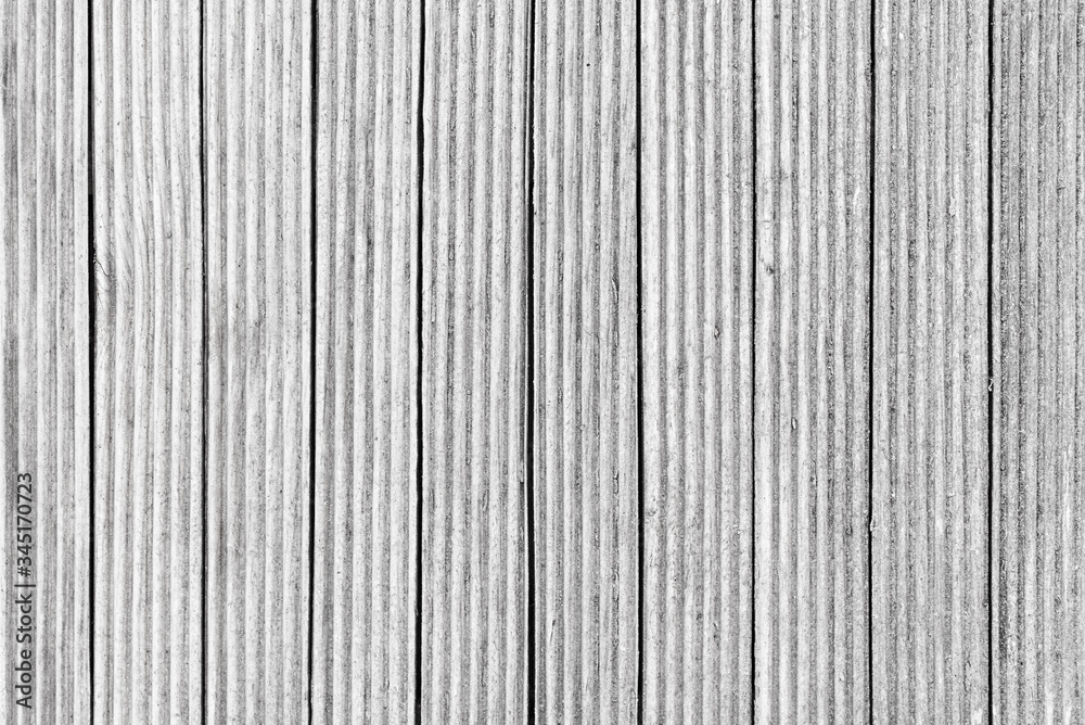 Vertical wooden planks as a background. Grunge wood texture Vertical wooden planks as a background. Grunge wood texture