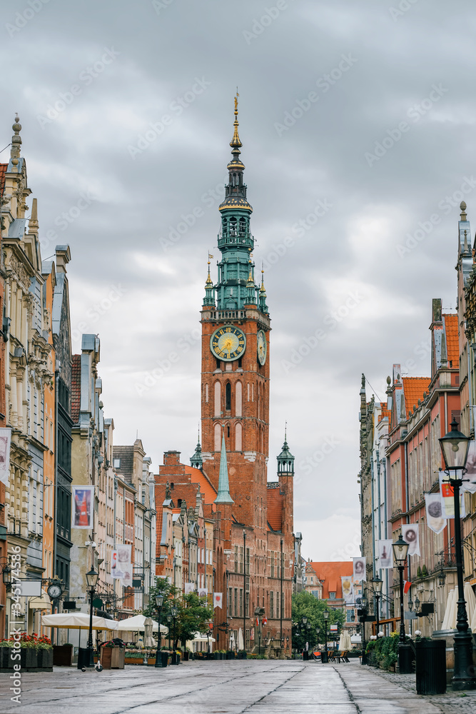 Main City Hall at empty Long Lane street in the old city, Poland.