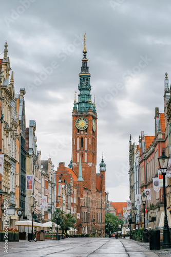 Main City Hall at empty Long Lane street in the old city, Poland.