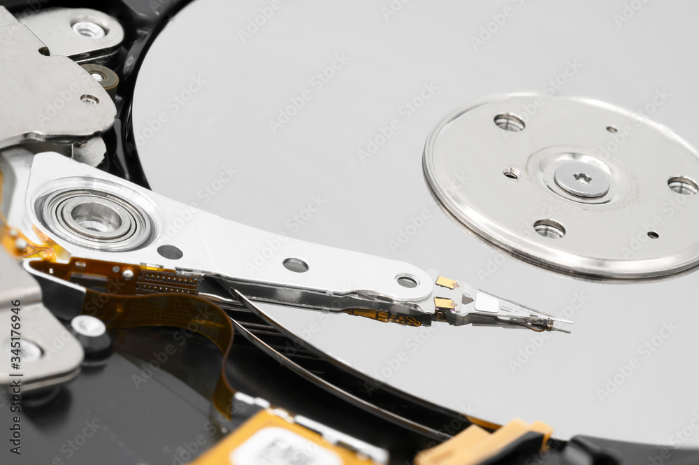 Computer hard drive. Close-up of disassembled hard drive . Computer hard drive. Close-up of disassembled hard drive .