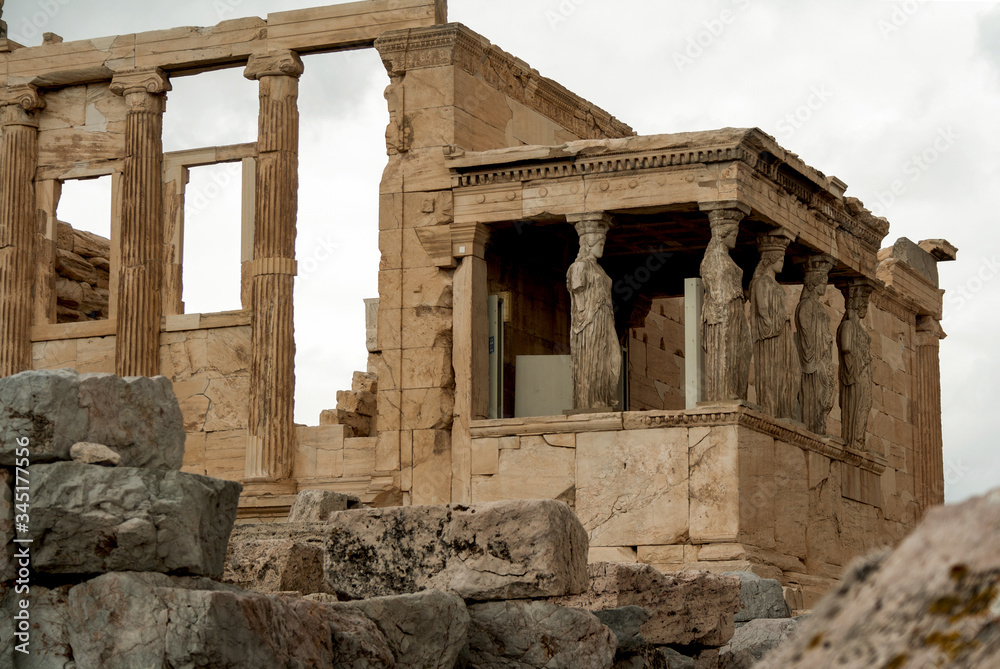 Temple Erechtheion with the famous porch of the caryatids instead of columns in the Acropolis